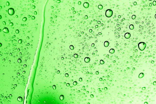 istock water drops on green glass 881185624