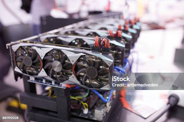 Cryptocurrency Mining Equipment Lots Of Gpu Cards On Mainboard Stock Photo - Download Image Now