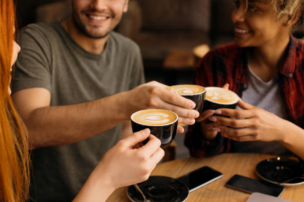 cheers - espresso men coffee shop drinking stock-fotos und bilder