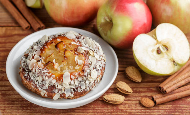 istock Homemade Apple pie with almonds and cinnamon. Dessert for tea in a rustic style. Selective focus 881264104