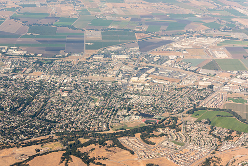 The city of Gilroy lies mostly to the west of US 101, on the other side of the freeway are the remenants of the agricultural fields that once dominated Santa Clara Valley.