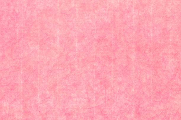 istock spring pink background of traditional paper texture 881314054