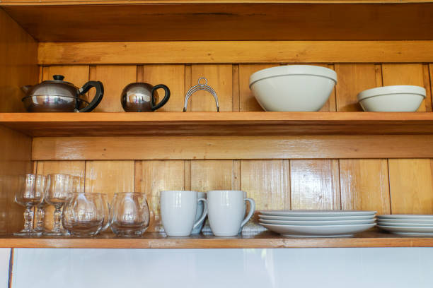 istock kitchenware and utensil on wooden shelf 881318870
