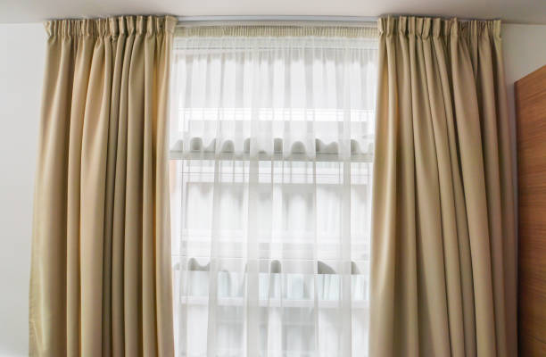 istock luxury curtain at window in house 881318884