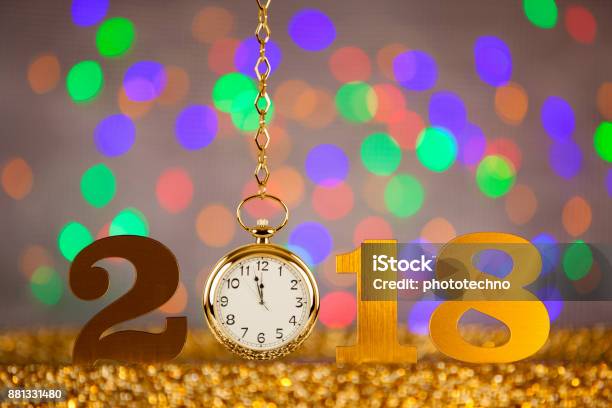 New Year 2018 With Gold Clock On Colored Background Stock Photo - Download Image Now