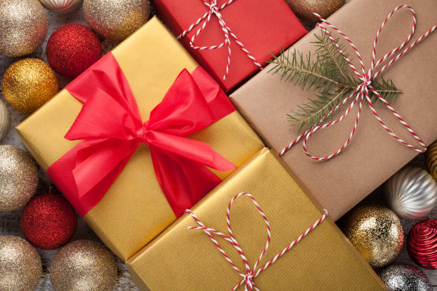 istock Colored boxes with gifts in a festive box with Christmas decorations. Top view 881337388