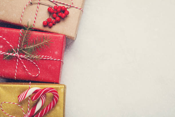 istock art Christmas holidays composition on white concrete background with Christmas tree decoration and copy space for your text. Top view 881337396