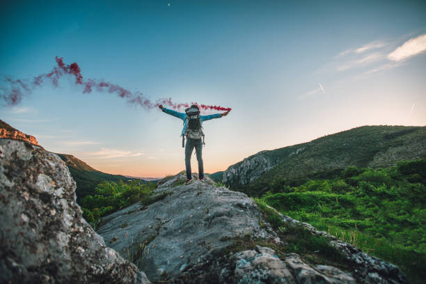 istock Hiker with flaming torch 881347980