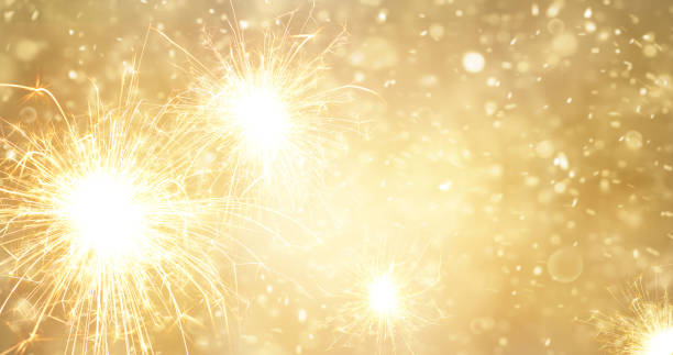 istock Abstract gold bright fireworks and sparkler at new year background 881350658