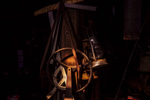 istock Hand saws, a gas lantern, and other tools in the barn workshop at an Indiana farm. 881355962