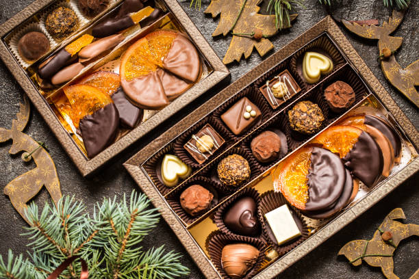 istock chocolate sweets with Christmas symbols, toys, tree 881361814