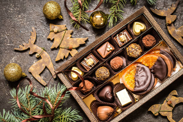 istock chocolate sweets with Christmas symbols, toys, tree 881361908
