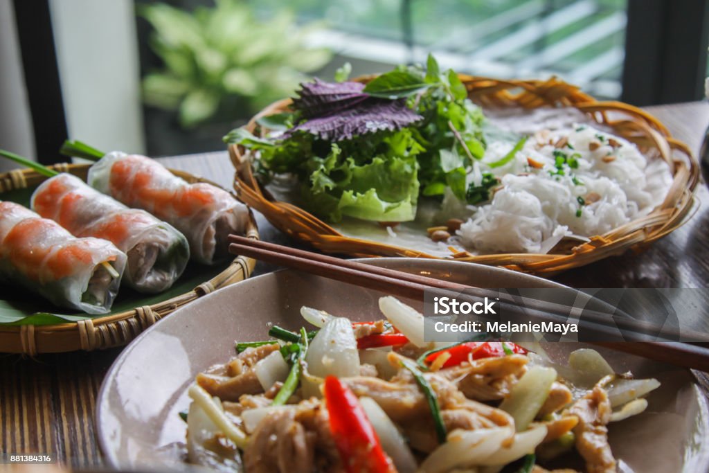 Vietnamese food arranged on table Vietnamese Cuisine Stock Photo