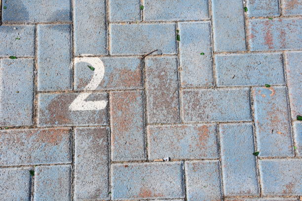 istock Playing in the yard of a school on the sidewalk 881400346