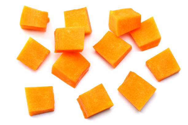 istock piece of pumpkin isolated on white background top view 881419190