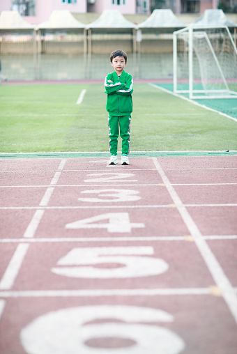 Boy on the running track