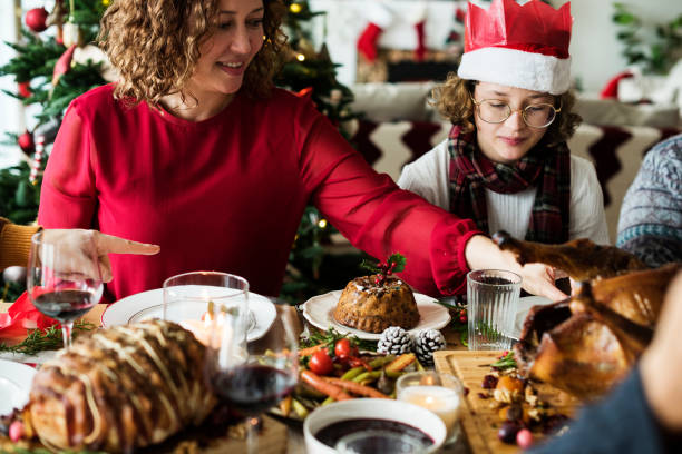 istock Family having a Christmas dinner 881439480