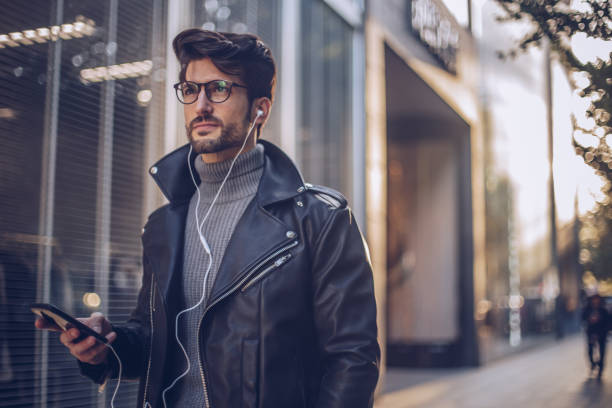 istock Man listening music 881442996