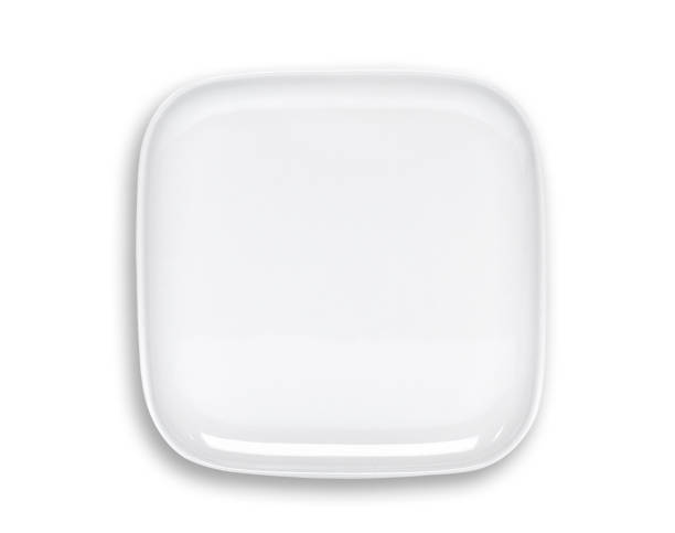 istock top view of empty white plate isolated on white background 881459644