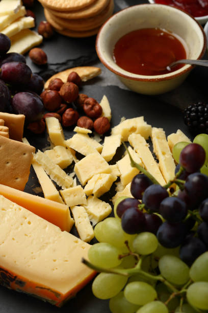 istock Cheese snack on slate, food closeup 881459762
