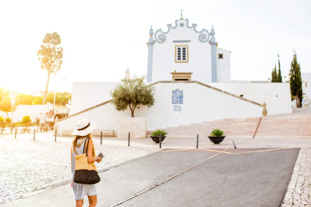 Woman traveling in Albufeira, Portugal Young woman traveling in Albufeira town on the south of Portugal albufeira photos stock pictures, royalty-free photos & images