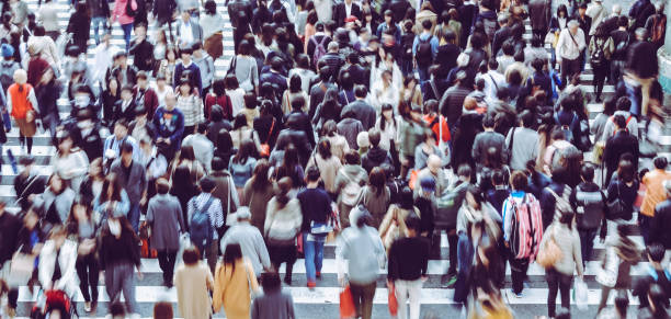 istock Asian People are across the crosswalk 881464564