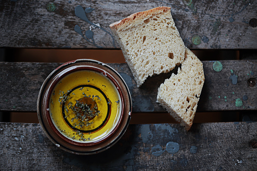 Sliced fresh bread for dipping and enjoying with extra virgin olive oil.