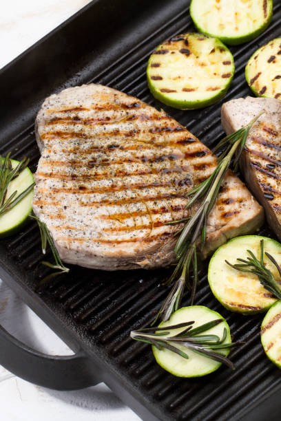 istock Grilled swordfish with rosemary and courgettes 881467848