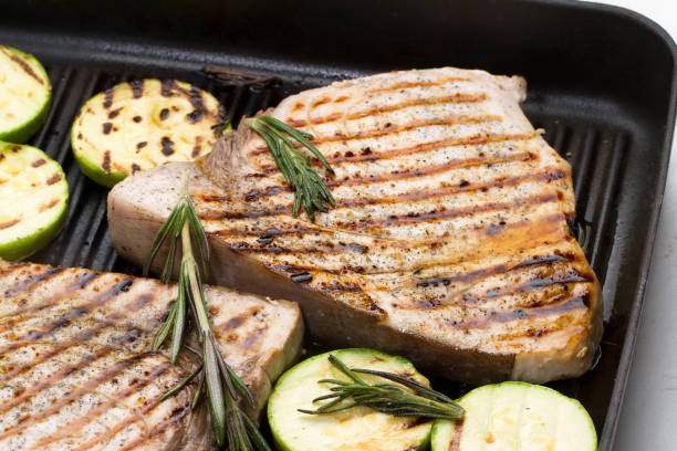 istock Grilled swordfish with rosemary and courgettes 881467946