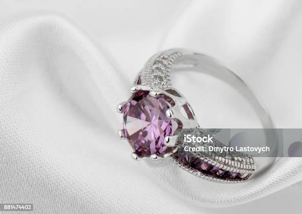 Jewelery Ring On White Cloth Background Stock Photo - Download Image Now - Jewelry, Ring - Jewelry, Amethyst