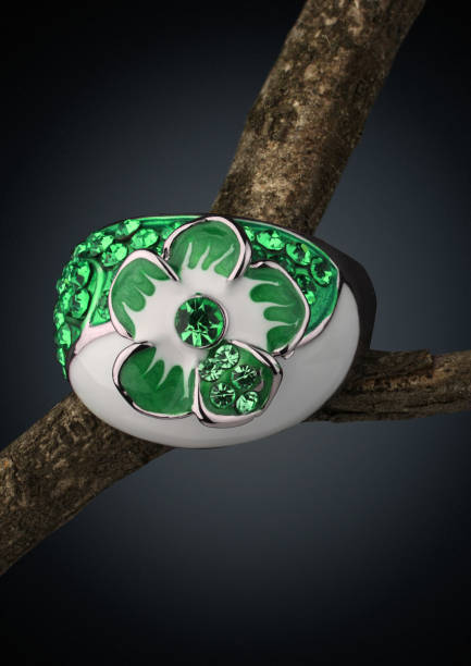 istock Jewelery ring on twig, dark background 881474408