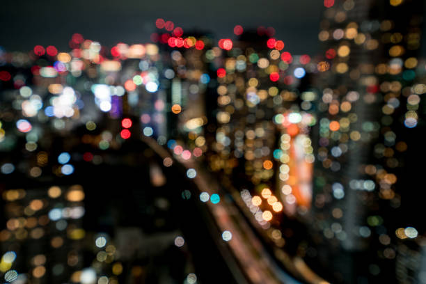 istock Light bokeh in night city, focus is blur. 881474778