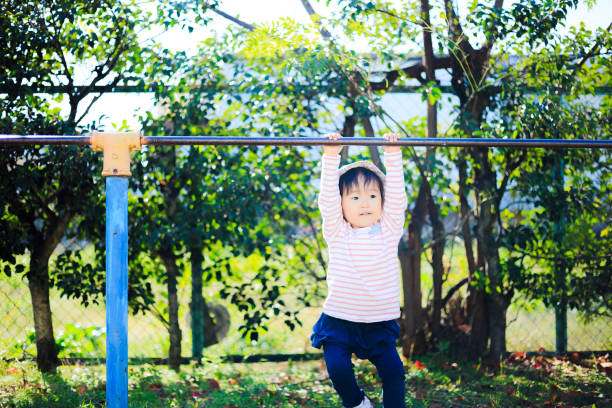 istock Cute children playing in the playground 881477734
