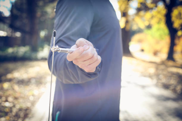 istock Man hand holding jump rope. Close up. 881481706