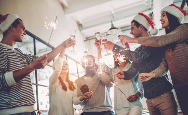 istock Celebrating Christmas in office. 881484766