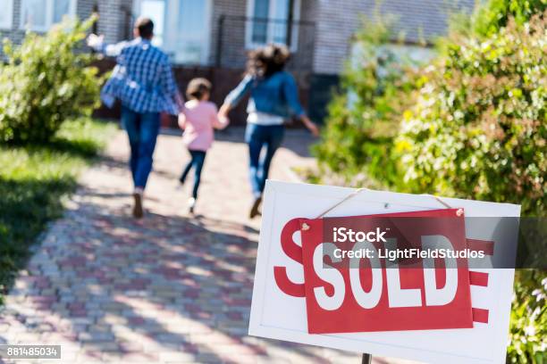 Family Running To New House Stock Photo - Download Image Now - Selling, Family, House