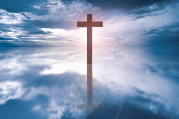 istock Wooden cross on the river 881499906