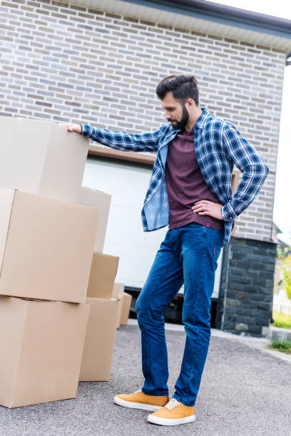 istock man moving into new house 881500054