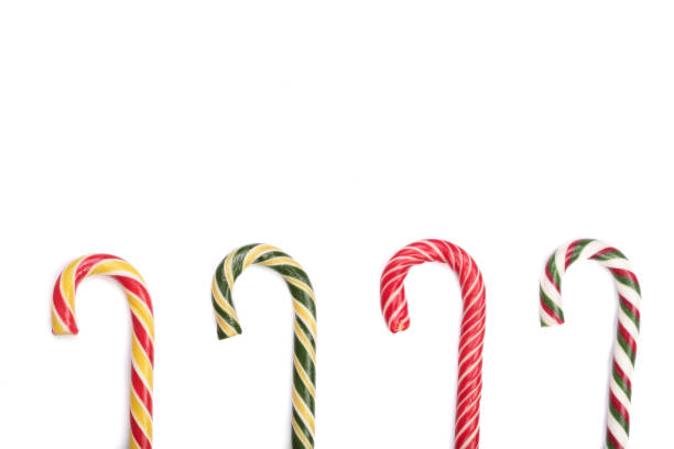 istock Candy cane striped isolated on white background with copy space for your text. Top view 881500184