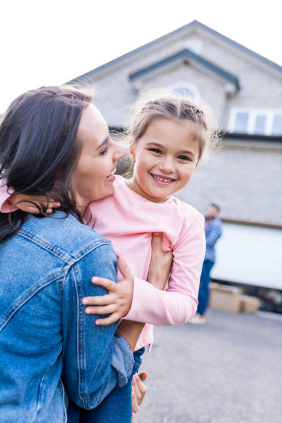 istock mother and daughter embracing 881500346