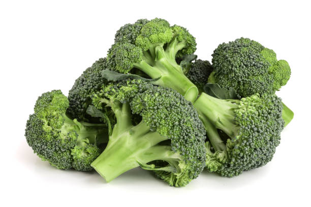 istock fresh broccoli isolated on white background close-up. Top view 881501172