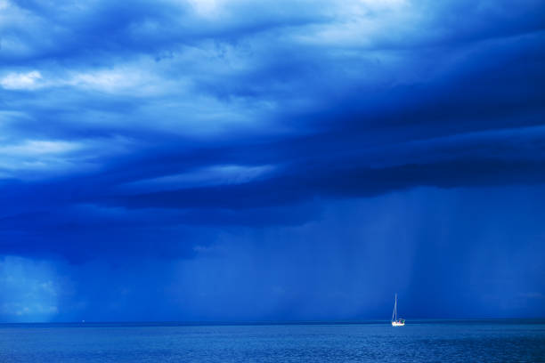 istock Sailing boat at stormy sea 881507904