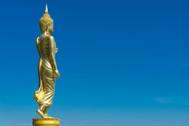 istock Buddha Statue with clear blue sky is located on the high mountain 881508460