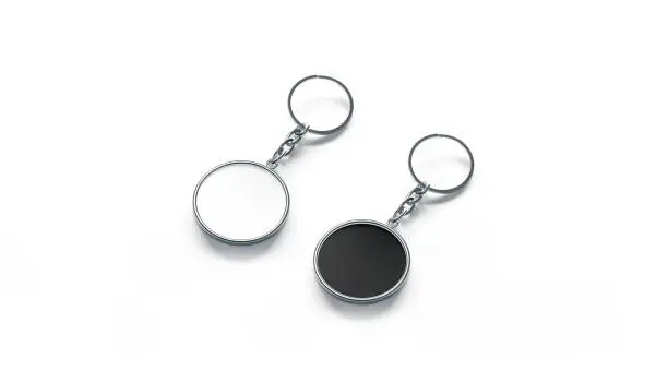 Photo of Blank metal round black and white key chain mock up