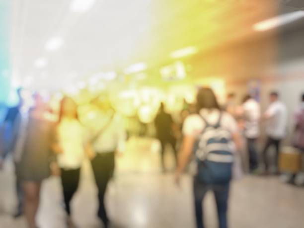 istock Abstract blurred image of people waiting for train coming and using mobile phone in electric sky train station. (BTS : sky train) in Thailand. 881514640