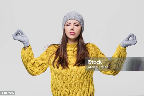 Young Woman Meditating Stock Photo - Download Image Now - Emotional Stress, Winter, Christmas