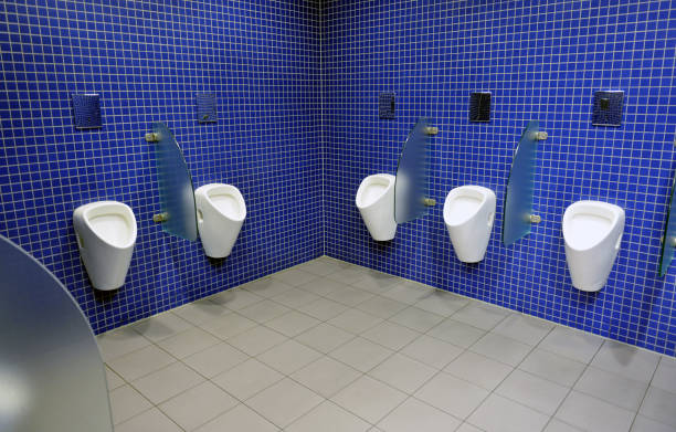 automatic urinals in a modern toilet - toilet public restroom bathroom flushing imagens e fotografias de stock