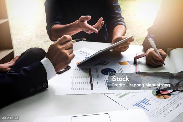 Business People Using Pentabletnotebook Are Planning A Marketing Plan To Improve The Quality Of Their Sales In The Future Stock Photo - Download Image Now