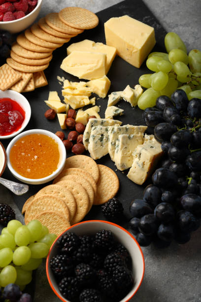 istock Variety cheese on slate, food closeup 881549278