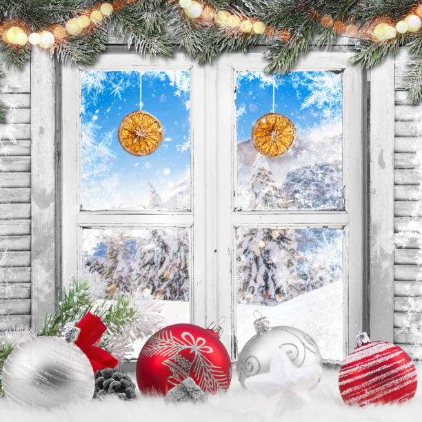 istock Christmas old white window with decorations 881550240